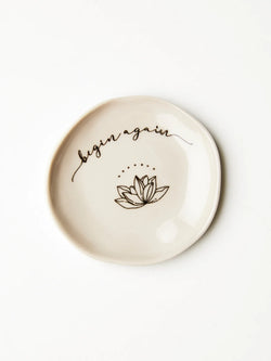 This ceramic 'Begin Again Dish' is a perfect holder for your rings, jewellery and small trinkets. A great reminder for the recipient to begin again each day.