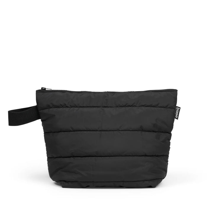 Stash it. Store it. Carry it. The ultra-soft Large Cloud Black Stash Clutch by Base Supply is stylish and seriously practical.   The chunky zip closure keeps valuables contained. And the sturdy cotton handle lets you hang or carry.  * Soft padded polyester fabric outer with cloud-like faux down fill  * Internal zip pocket  * Machine washable  * W (top) 39cm | W (bottom) 26cm | H 27cm | D 13cm  * Designed by Base Supply in Melbourne, Australia 