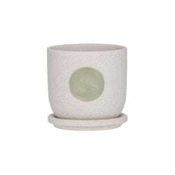 This Small Green Rocio Pot is both stylish and practical, a brilliant focal point in any given room  Made from white ceramic, it has a short body and comes with a drainage hole and saucer. It displays a light green circle on the exterior.  Place your favourite plants in this pot and display around your home for a charming approach. It’s a popular choice for florists, visual merchandising capsules, and homes across Australia.   *Material: Ceramic  *Size: 12x12x12cm  *Indoor use only