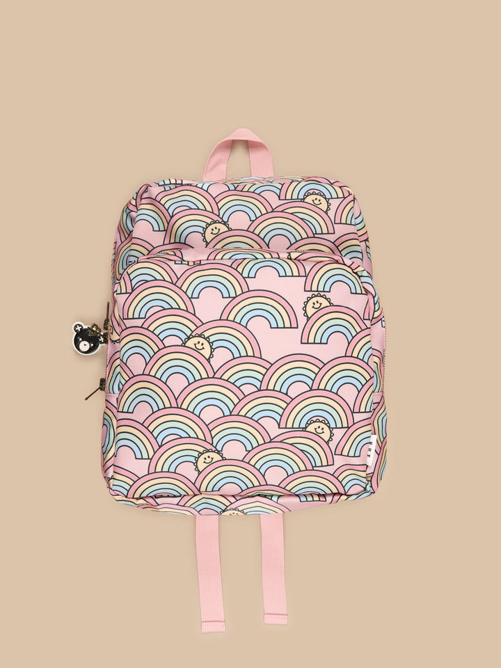 Your little one will be zooming around with the Sunrise Backpack by Huxbaby!  Padded back and adjustable shoulder straps make this every day essential super comfortable and durable.  Features front zip pocket, internal zip pocket in main compartment and top handle Size: 32.5cm x 25.5cm x 10cm Safe azo free dyes Spot clean only with damp cloth Packaged in a 100% recycled LDPE bag Designed in Melbourne, Australia by Huxbaby 