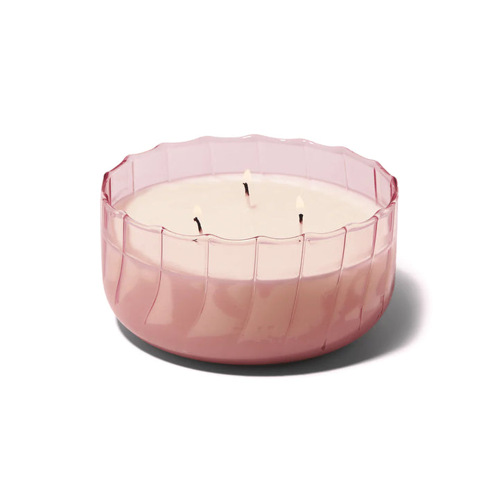 The Desert Peach Large Ribbed Glass Candle by Paddywax is designed to elevate tablescapes.   Bring a vintage touch to your next dinner party with the subtle and finely ribbed coloured glass vessels, available in both small and large sizes.  With a focus on sustainability, a repurposing tip is to try using the vessel as a votive for tea lights.  Top Notes: Peach, Bergamot, Cassis Buds, Pineapple Middle Notes: Neroli, Linden Blossom, Plum, Sweet Base Notes: Amber, Lactonic, Coconut, Sweet