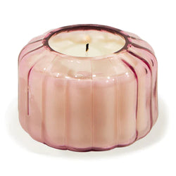 The Desert Peach Small Ribbed Glass Candle by Paddywax is designed to elevate tablescapes.   Bring a vintage touch to your next dinner party with the subtle and finely ribbed coloured glass vessels, available in both small and large sizes.  With a focus on sustainability, a repurposing tip is to try using the vessel as a votive for tea lights.  Top Notes: Peach, Bergamot, Cassis Buds, Pineapple Middle Notes: Neroli, Linden Blossom, Plum, Sweet Base Notes: Amber, Lactonic, Coconut, Sweet