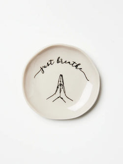 Set your intentions with the cutest small gift for your bestie, mum, sister, friend Or keep it for yourself!  This ceramic 'Breathe Dish' is a perfect holder for your rings, jewellery and small trinkets. A great reminder for the recipient of the importance of taking some deep breathes to give us some perspective on life.  *L: 7cm | W: 7cm | H: 1cm  *Designed in Sydney and handmade in Vietnam by Jones & Co artisans