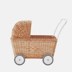 We are obsessed with this Natural Strolley by Olli Ella!  It's a new kind of convertible, one that goes from being a pram/ buggy/ stroller to a trolley with just a flip of a lid.