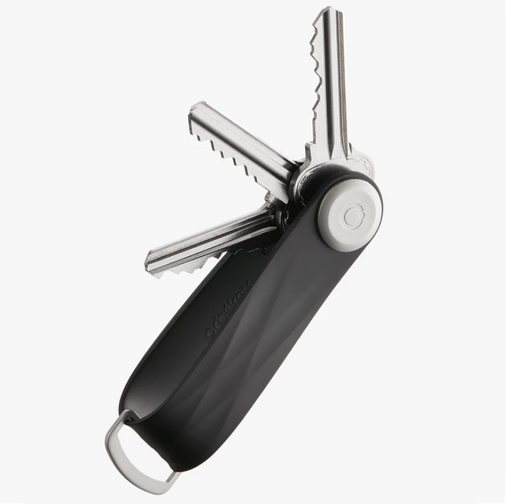 The answer to your pocket jingling woes is the Black Active Orbitkey!