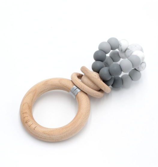 Ease your bubs teething with these Ring Pop Teethers in Grey Ombre!  Designed by Lluie in Melbourne, Australia; the ring pop teething Rattle™ twists 360 degrees, rattles beautifully and allows for a good hearty chomping session!