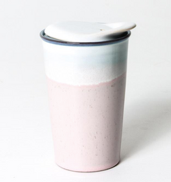 Want to save the planet but do it in style? Look no further than the Strawberry Milk Ceramic Coffee Cup by Indigo Love.