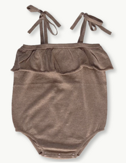 The Mushroom Frill Romper by Grown Clothing.  Lightweight romper in the softest yarn with ties at the shoulder and a frill. This romper has press snaps at the crotch seam for easy dressing. 