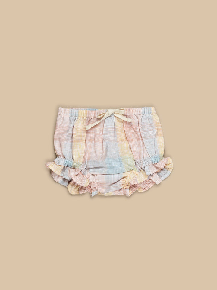The Rainbow Frill Bloomer combines an adorable rainbow check pattern with super sweet frill detailing! Made from super soft cotton