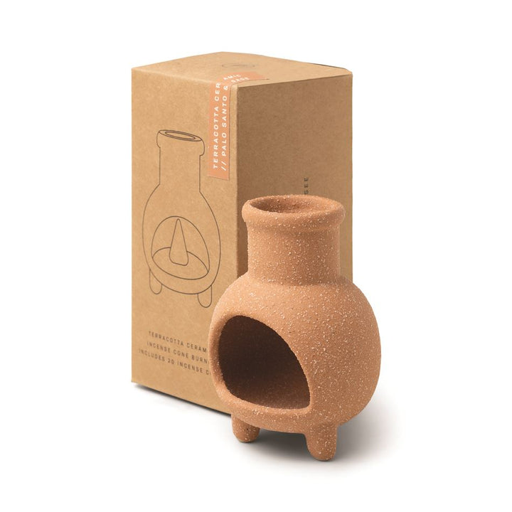 We are loving this Terracotta Ceramic Incense Cone Burner From Paddywax. Watch and smell the Chiminea release the Palo Santo & Sage fragrance from its flute.