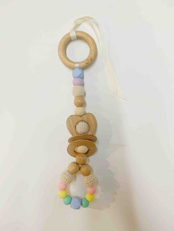 Ease your bubs teething with this Pastel Rainbow Love Teething Rattle Toy!  Designed by Lluie in Melbourne, Australia; the Love Teething Rattle Toy encourages little ones to explore important milestones through tummy time or whilst lying on their backs.