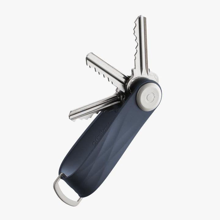 The answer to your pocket jingling woes is the Midnight Blue Active Orbitkey!