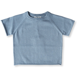 Add some fun to your SuperCool Kids Summer Wardrobe with this Powder Blue Raglan Tee by Grown Clothing!   This knitted jersey tee made with 100% organic cotton with GOTS certification. This tee has a rolled edge at the cuff and hem, a rib neck band and a raglan armhole. 