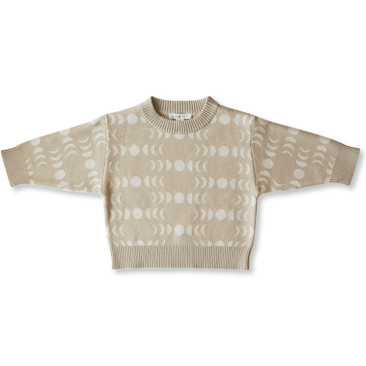 Knitted  jumper with a lunar moon phases Jacquard design made from 100% organic cotton with GOTS certification. This pull over has a dropped shoulder and a rib finish at neck, hem and cuffs.